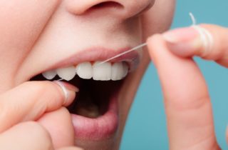 enhance oral hygiene by flossing properly